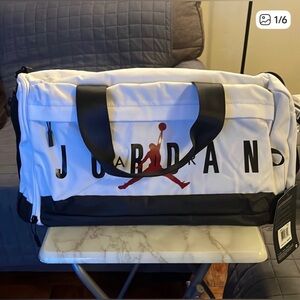 Jordan White and Black Duffel Bag with Red Logo
